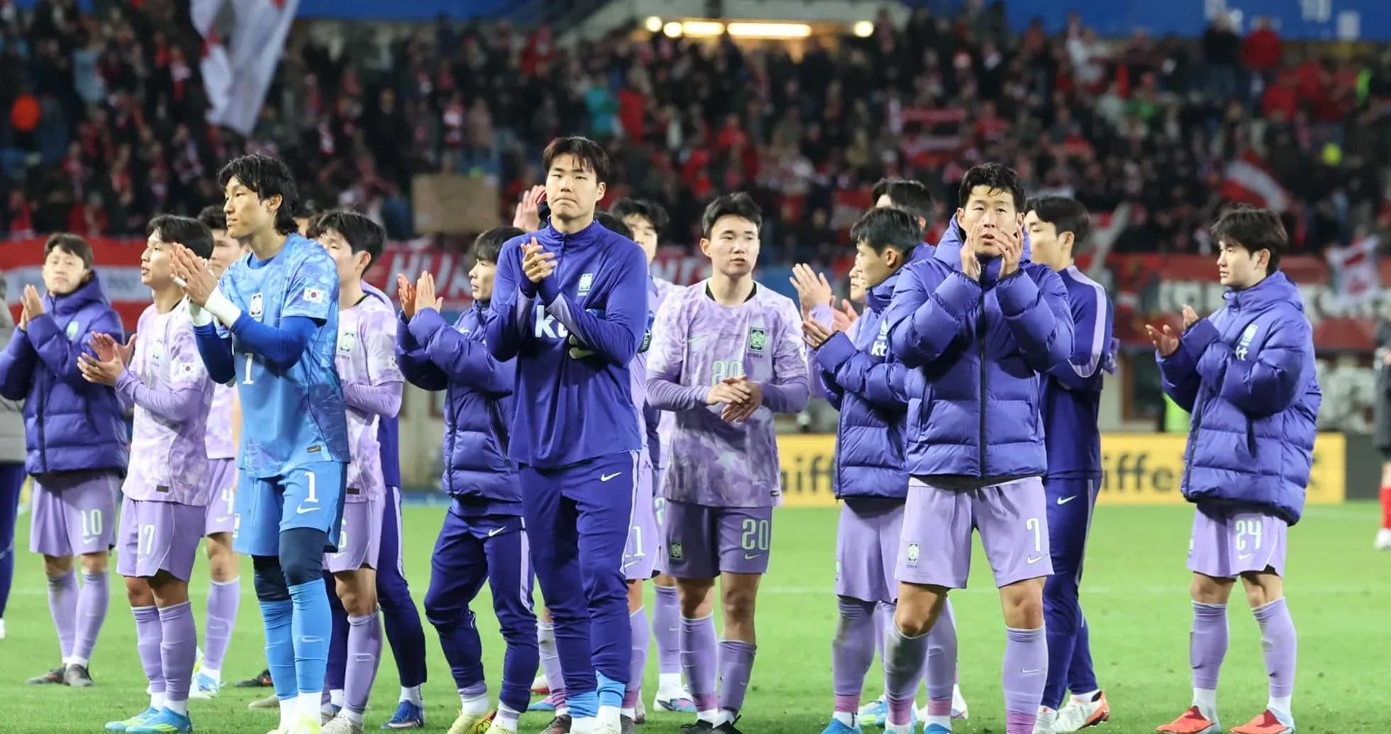 Team applauding fans after the match Team applauding fans after the match