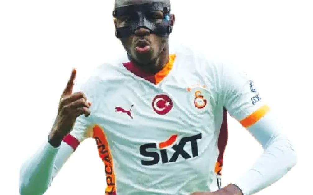 Player celebrating goal wearing protective mask Player celebrating goal wearing protective mask
