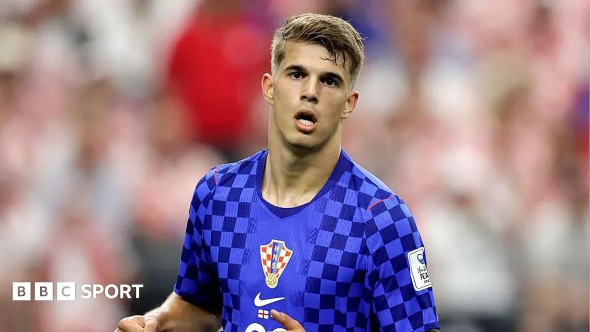 Croatian player in blue kit during match Croatian player in blue kit during match