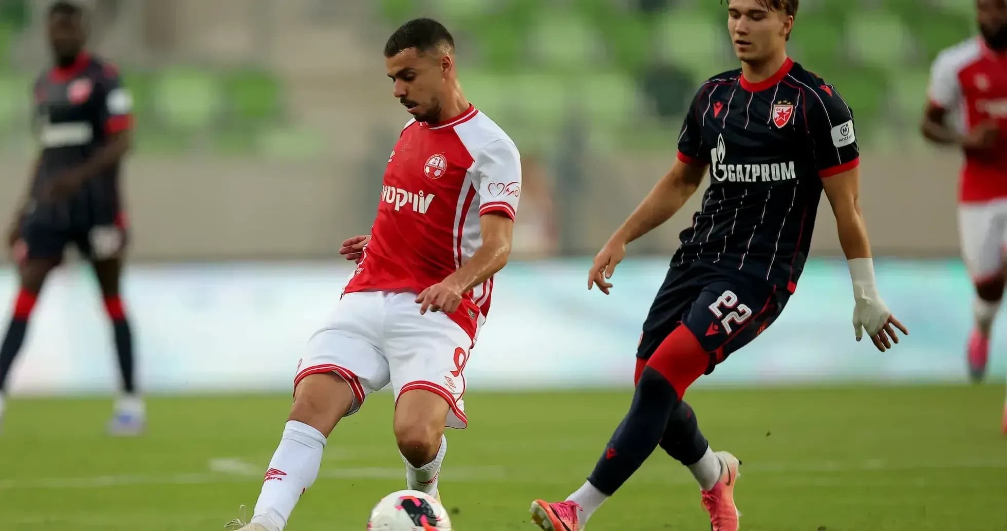 Players in action during FK Crvena Zvezda match Players in action during FK Crvena Zvezda match