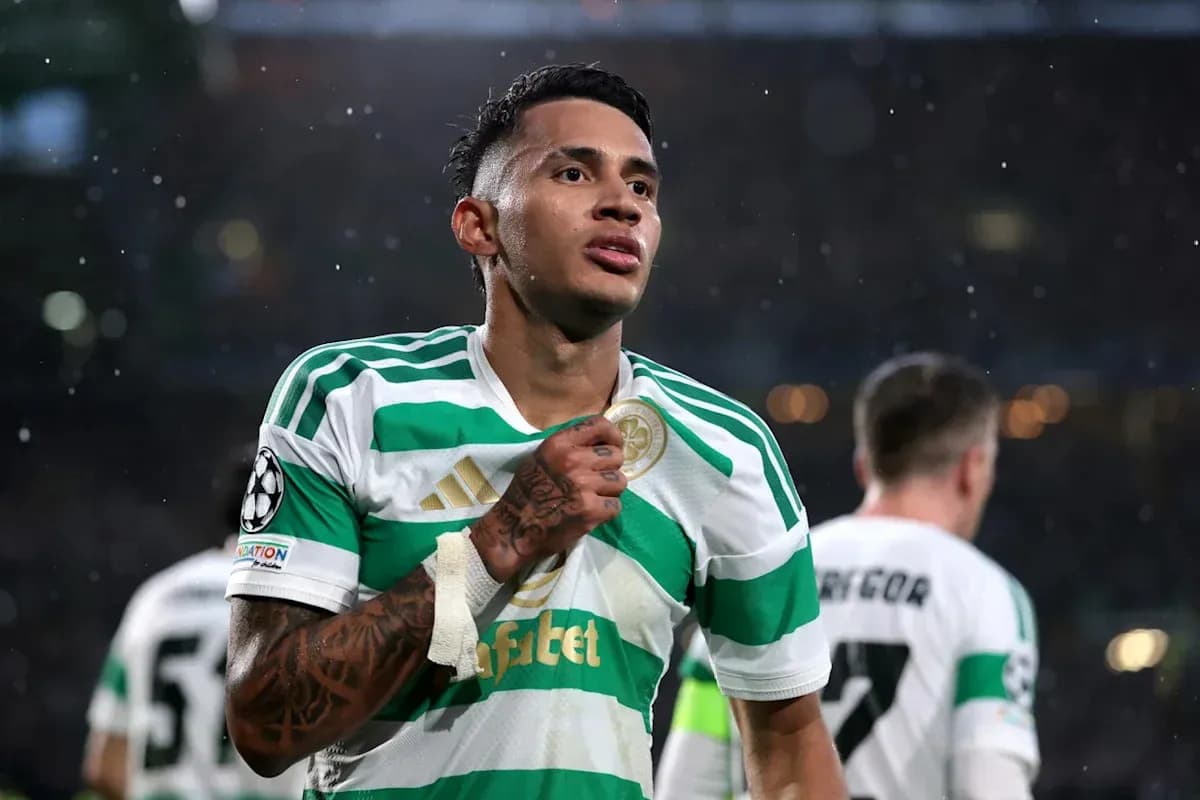 Player celebrating in Celtic jersey during match Player celebrating in Celtic jersey during match
