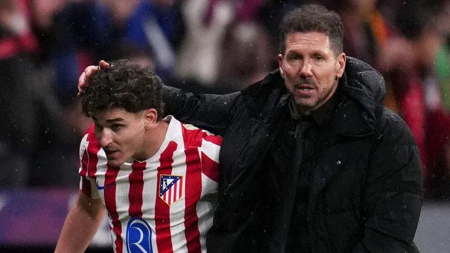 Atletico Madrid player assisted by coach during match Atletico Madrid player assisted by coach during match