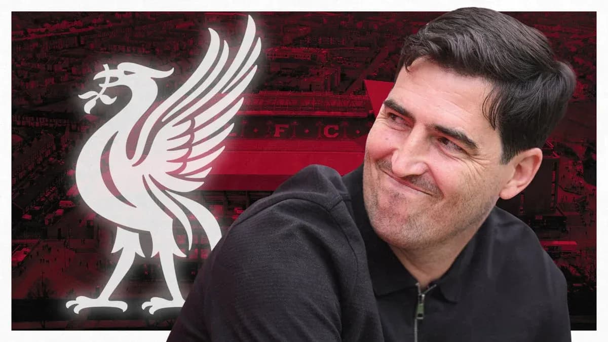 Person smiling with Liverpool logo in background Person smiling with Liverpool logo in background