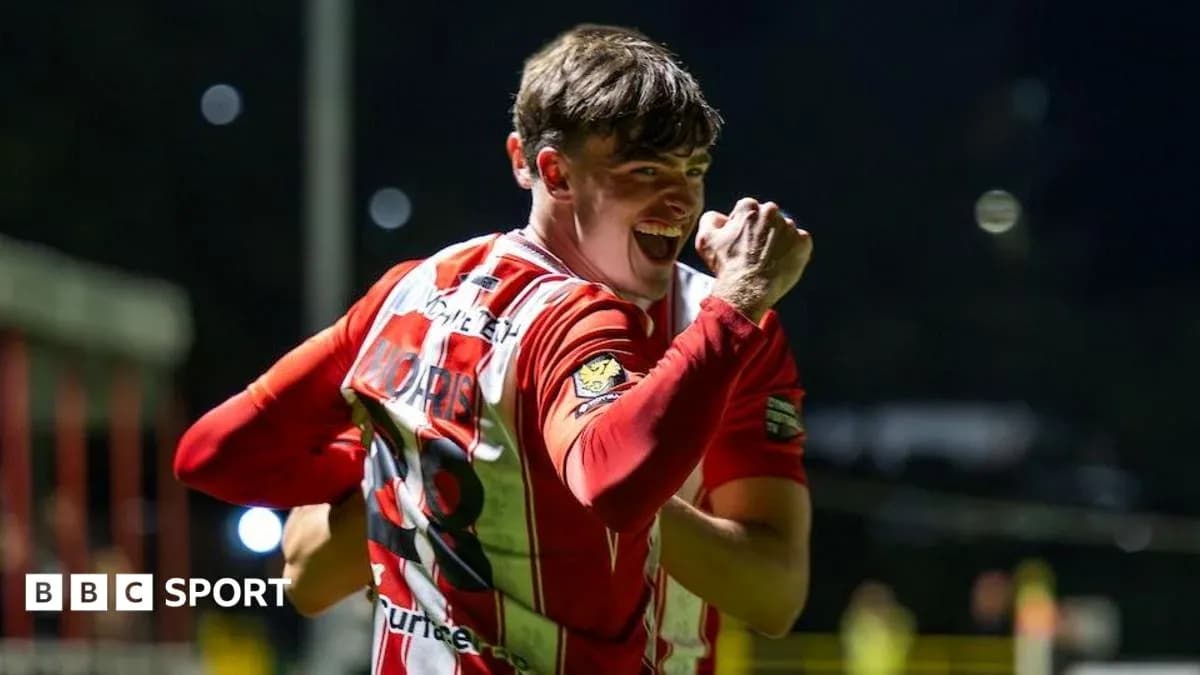 Player celebrating victory with clenched fist Player celebrating victory with clenched fist