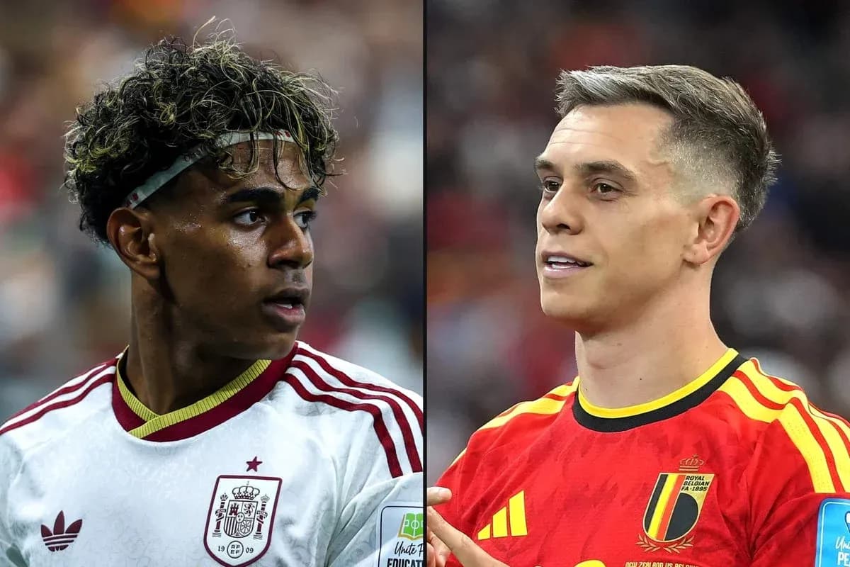 Two football players from Spain and Belgium facing each other Two football players from Spain and Belgium facing each other