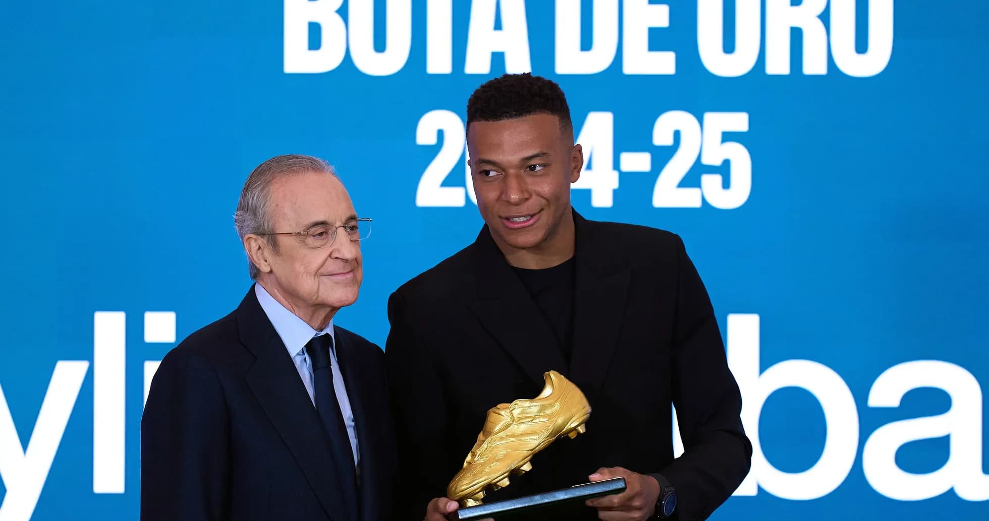 Player receiving Golden Boot award during ceremony Player receiving Golden Boot award during ceremony