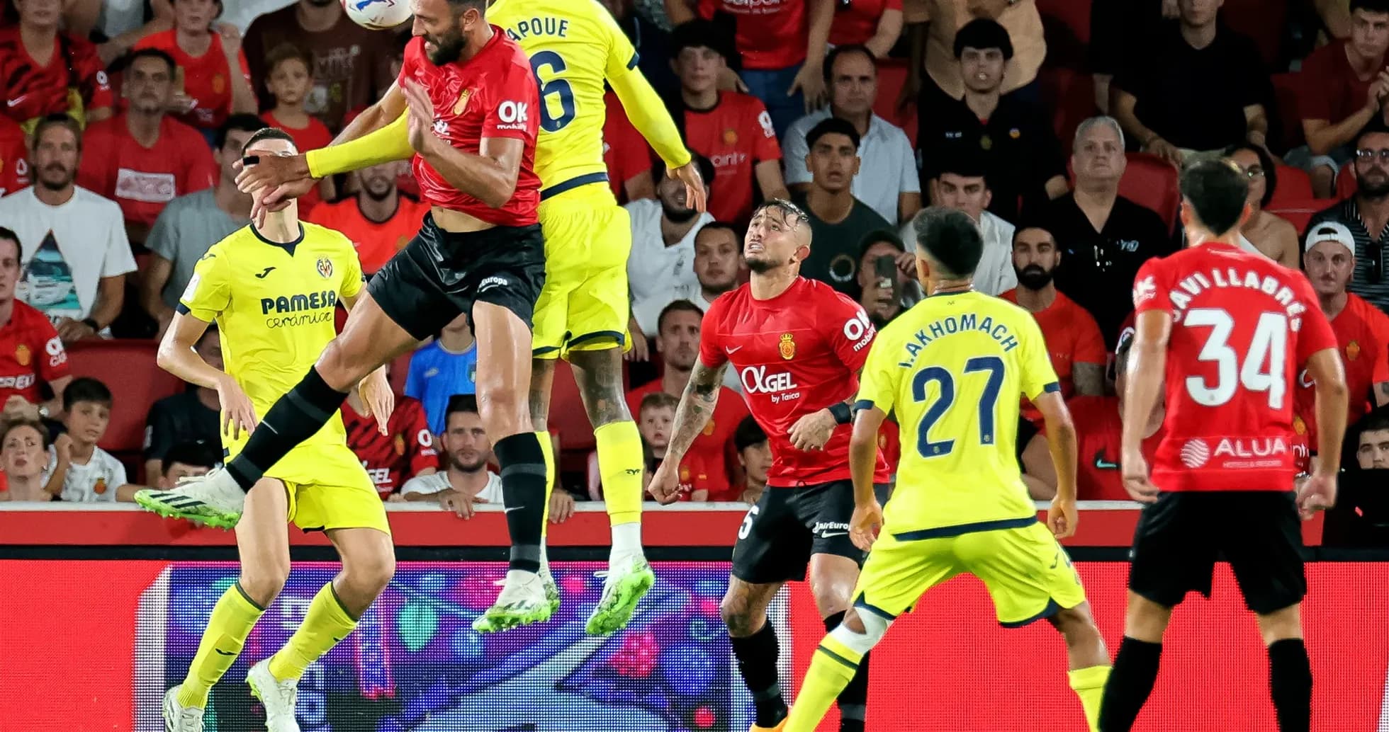 Players contesting a header during Mallorca match Players contesting a header during Mallorca match