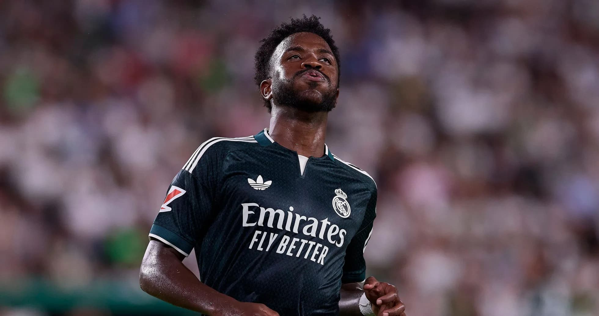 Player in Real Madrid jersey during a match Player in Real Madrid jersey during a match