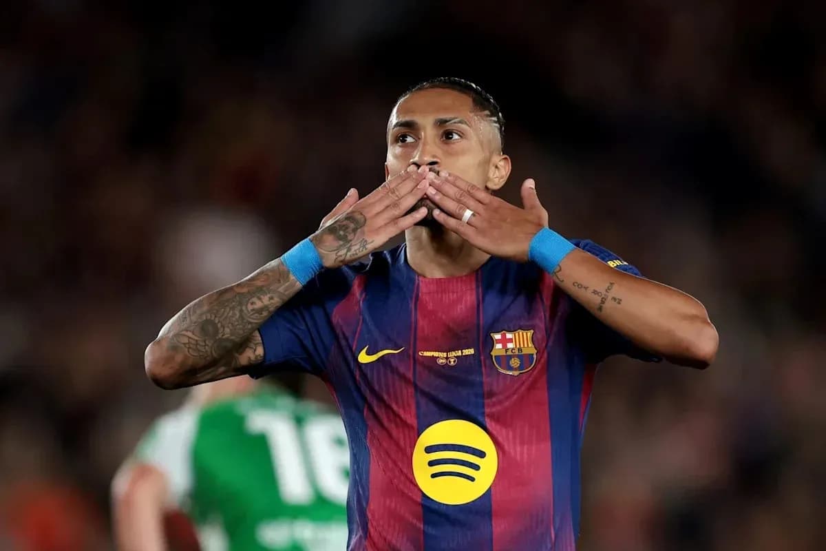 Player celebrating with kiss gesture during match Player celebrating with kiss gesture during match