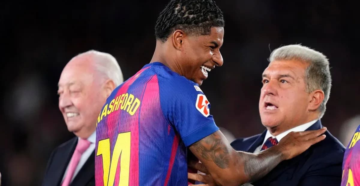 Player celebrating with officials after a match Player celebrating with officials after a match