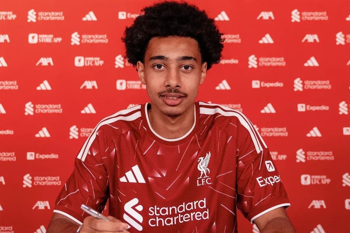 Player signing contract in Liverpool FC jersey Player signing contract in Liverpool FC jersey