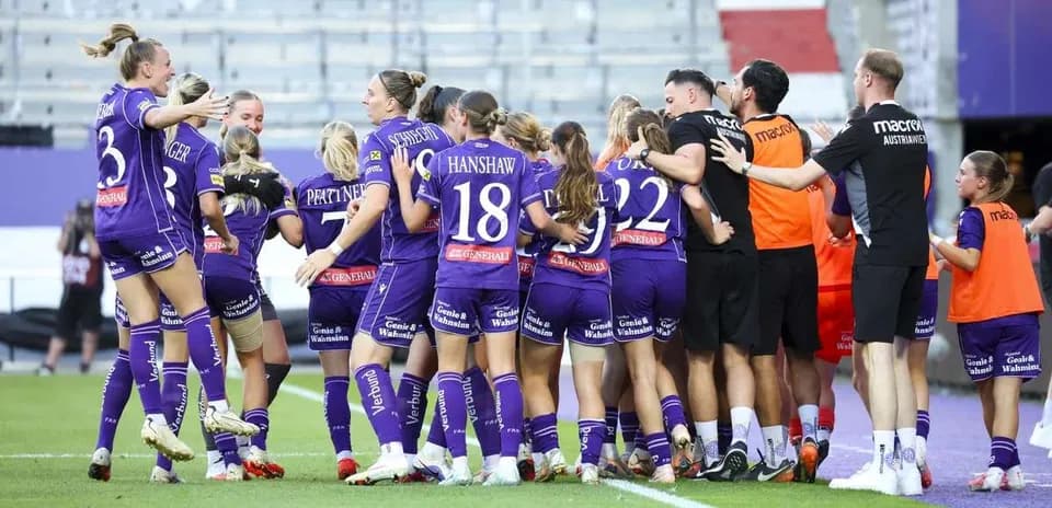 Austria Wien W celebrating a goal together Austria Wien W celebrating a goal together