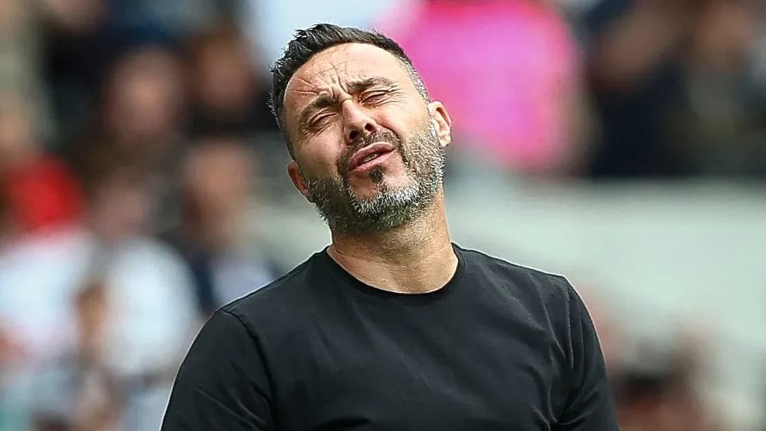 Coach reacting during a match on the sideline Coach reacting during a match on the sideline