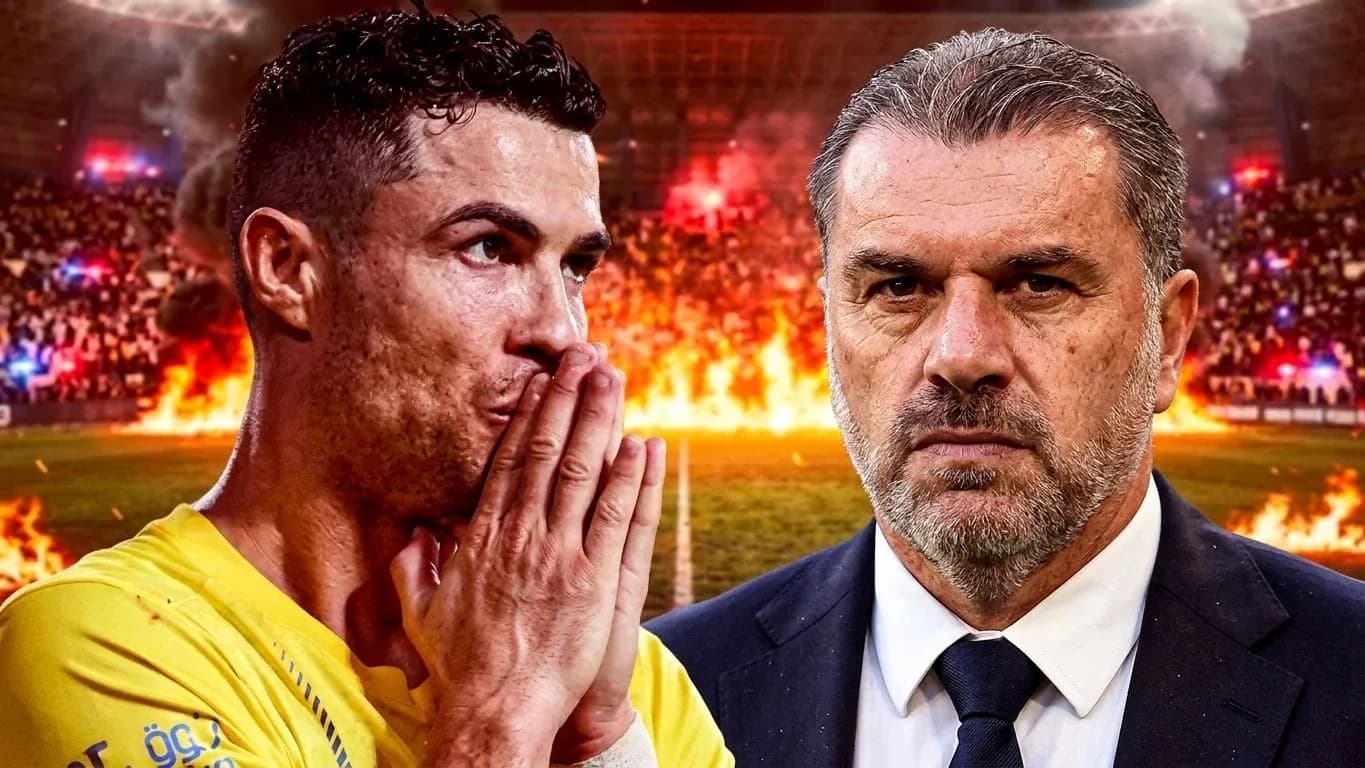 Cristiano Ronaldo and coach facing fiery stadium backdrop Cristiano Ronaldo and coach facing fiery stadium backdrop