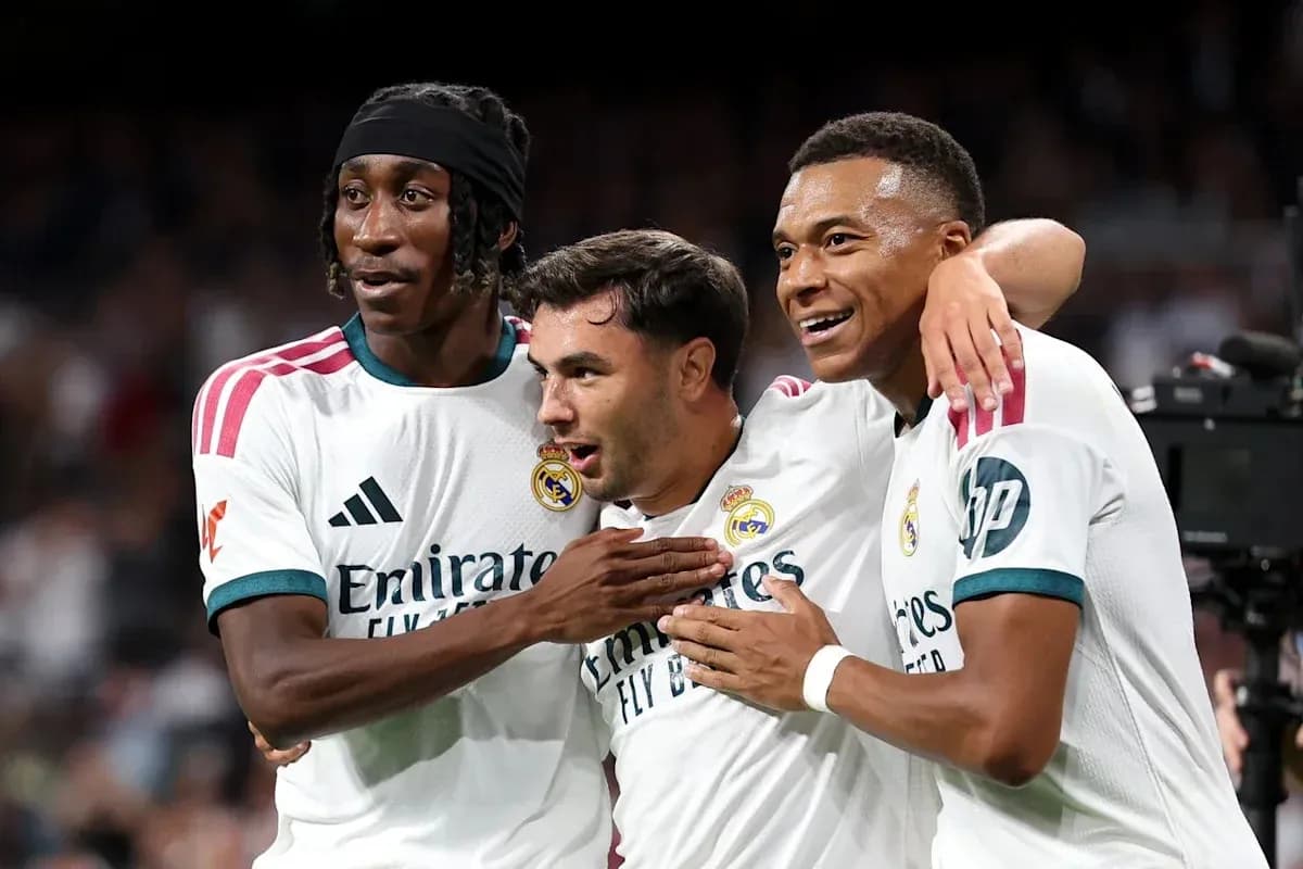 Real Madrid players celebrating a goal together Real Madrid players celebrating a goal together