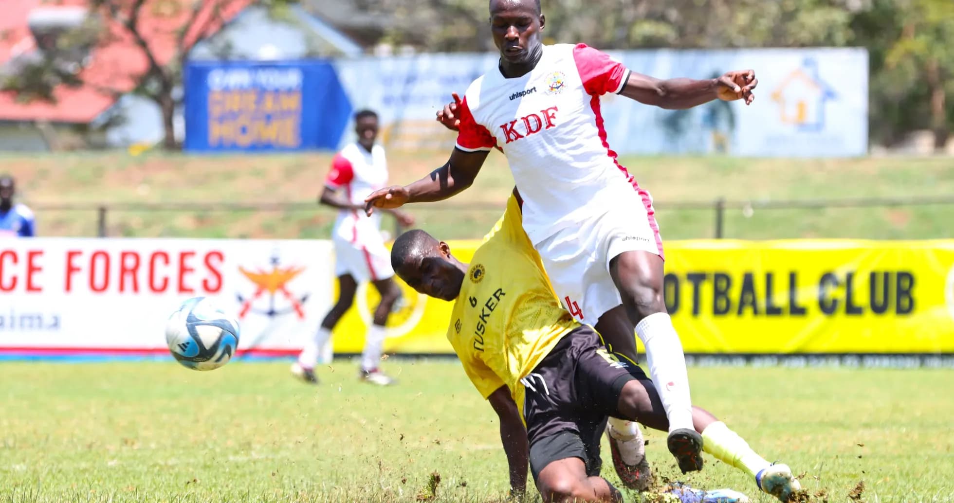 Player from Ulinzi Stars tackling Tusker player Player from Ulinzi Stars tackling Tusker player
