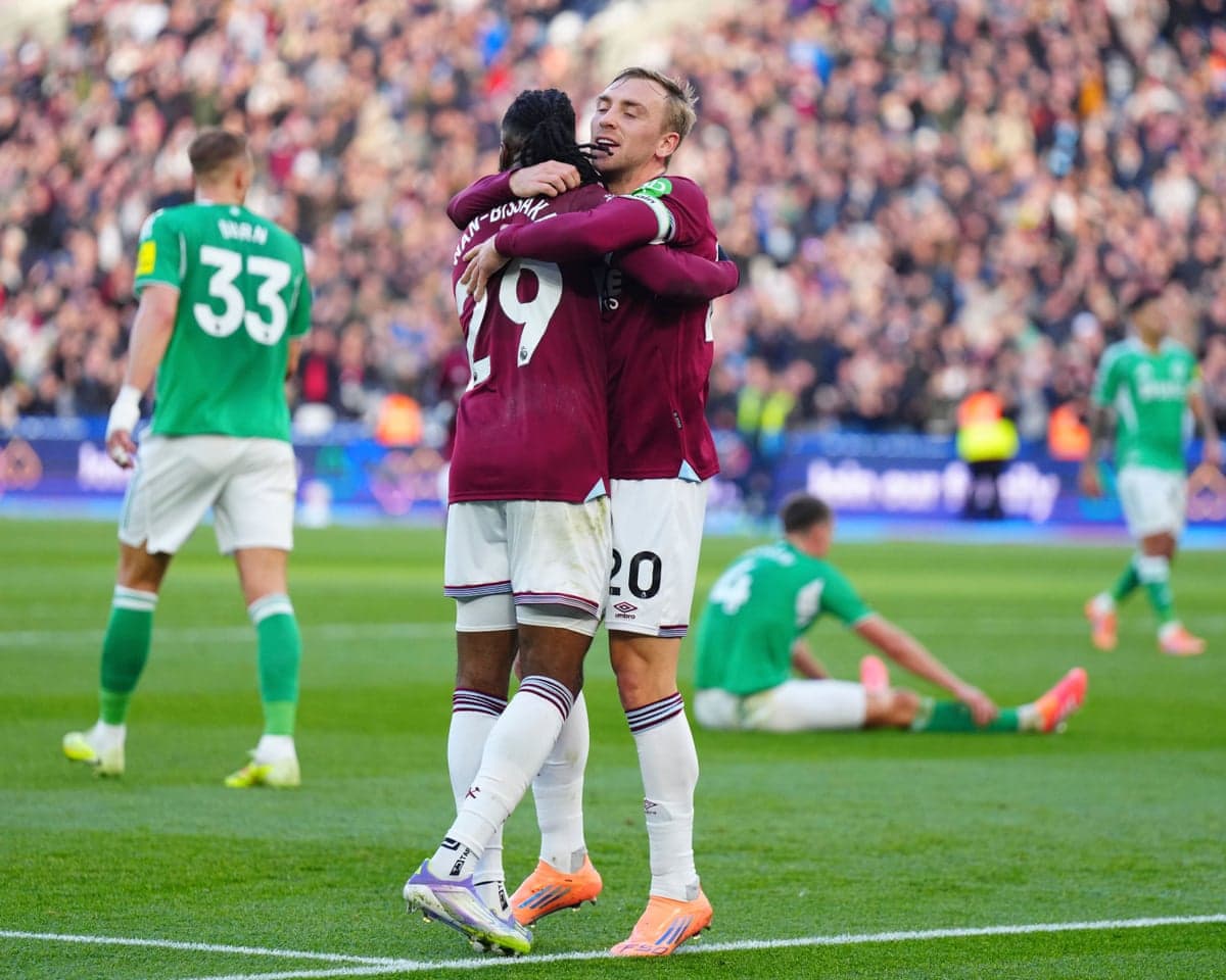 West Ham players celebrating a goal during match West Ham players celebrating a goal during match