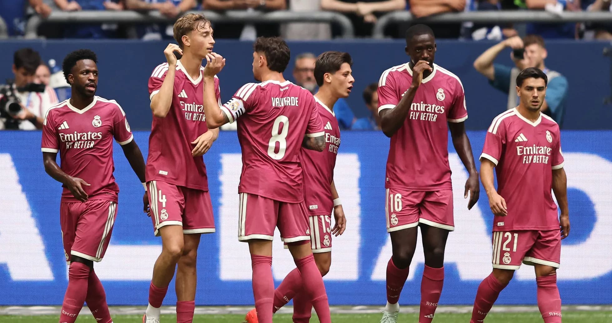 Real Madrid players celebrating a goal during match Real Madrid players celebrating a goal during match