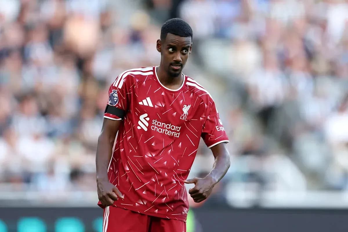 Player in Liverpool kit gesturing during match Player in Liverpool kit gesturing during match