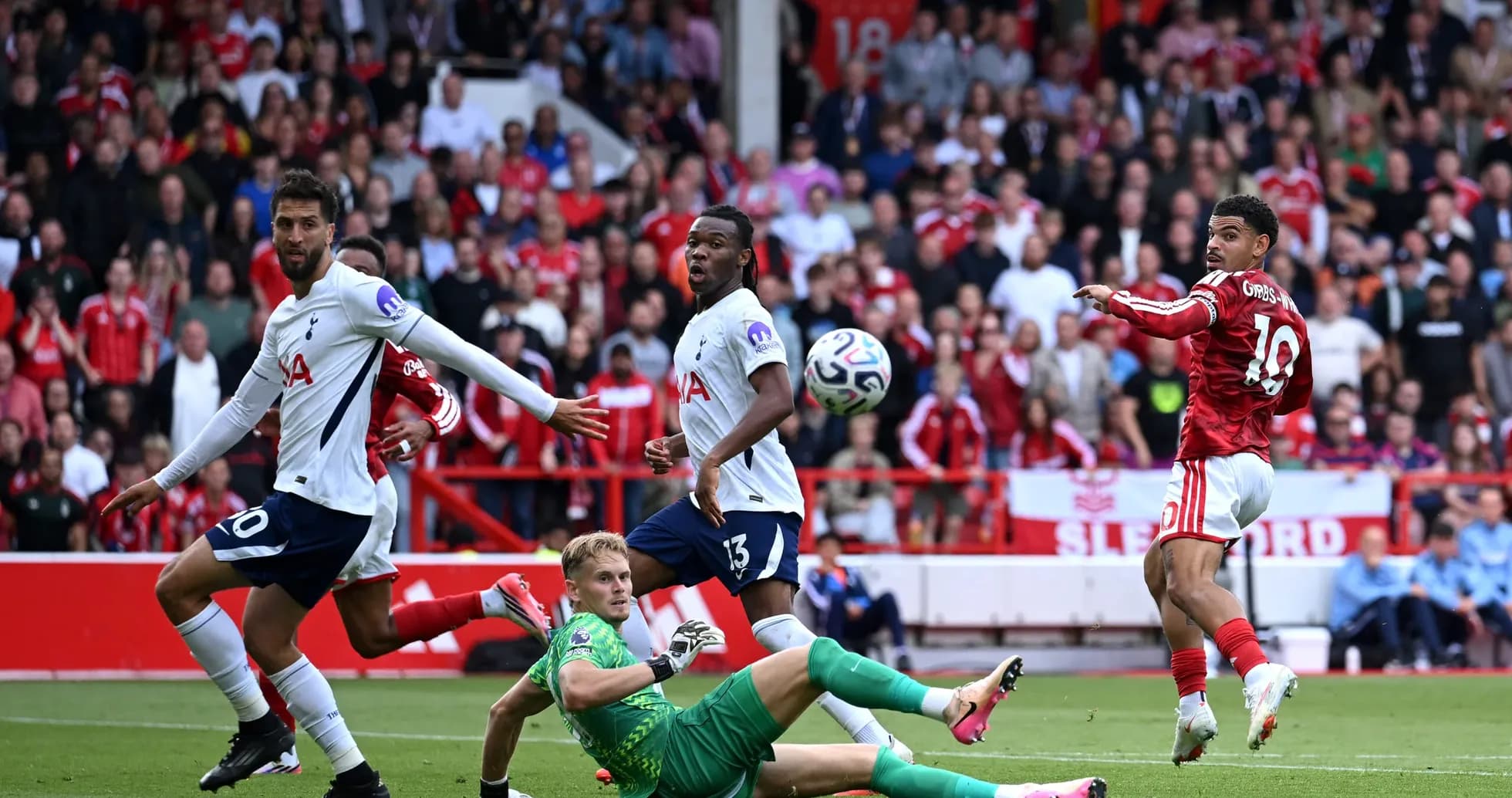 Nottingham Forest player shooting at goal Nottingham Forest player shooting at goal
