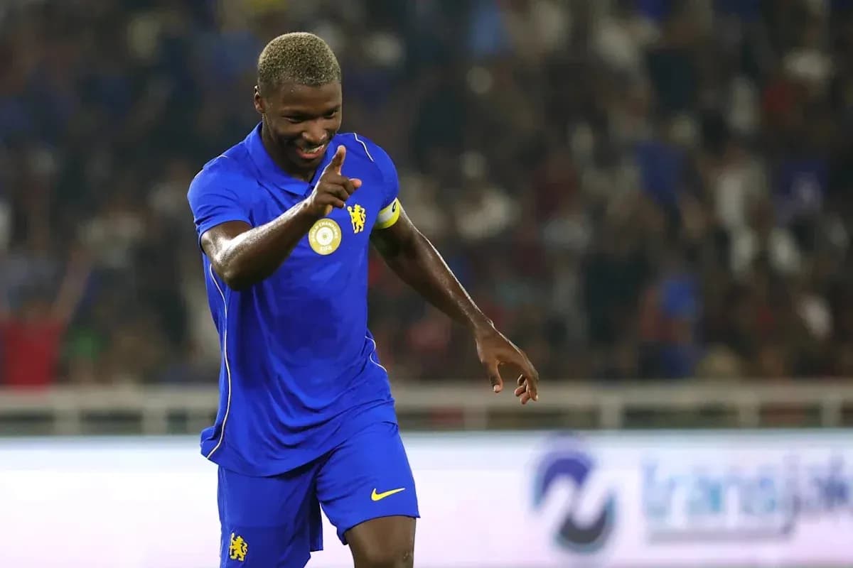 Player celebrating a goal during a match Player celebrating a goal during a match