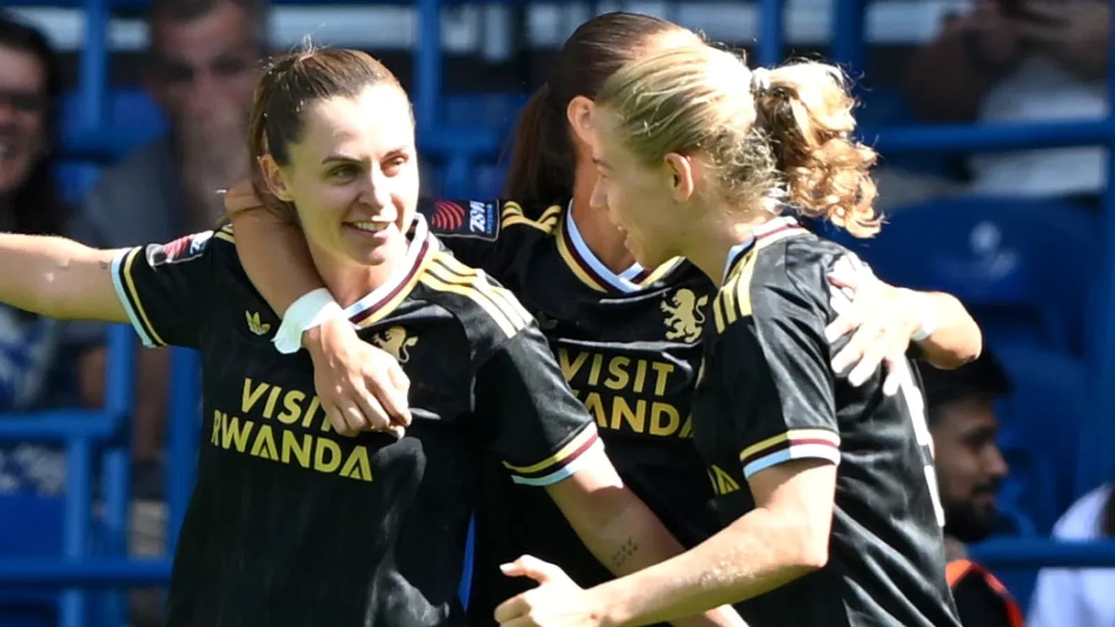 Players celebrating a goal during a match Players celebrating a goal during a match