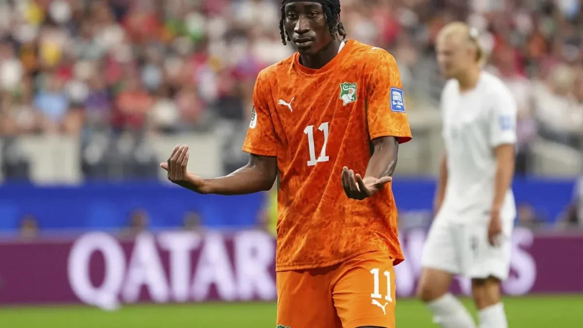 Player in orange jersey gesturing during match Player in orange jersey gesturing during match