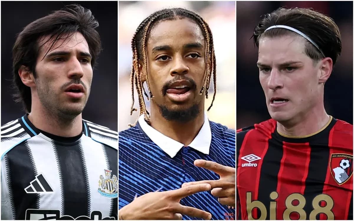 Three football players in club jerseys looking forward Three football players in club jerseys looking forward