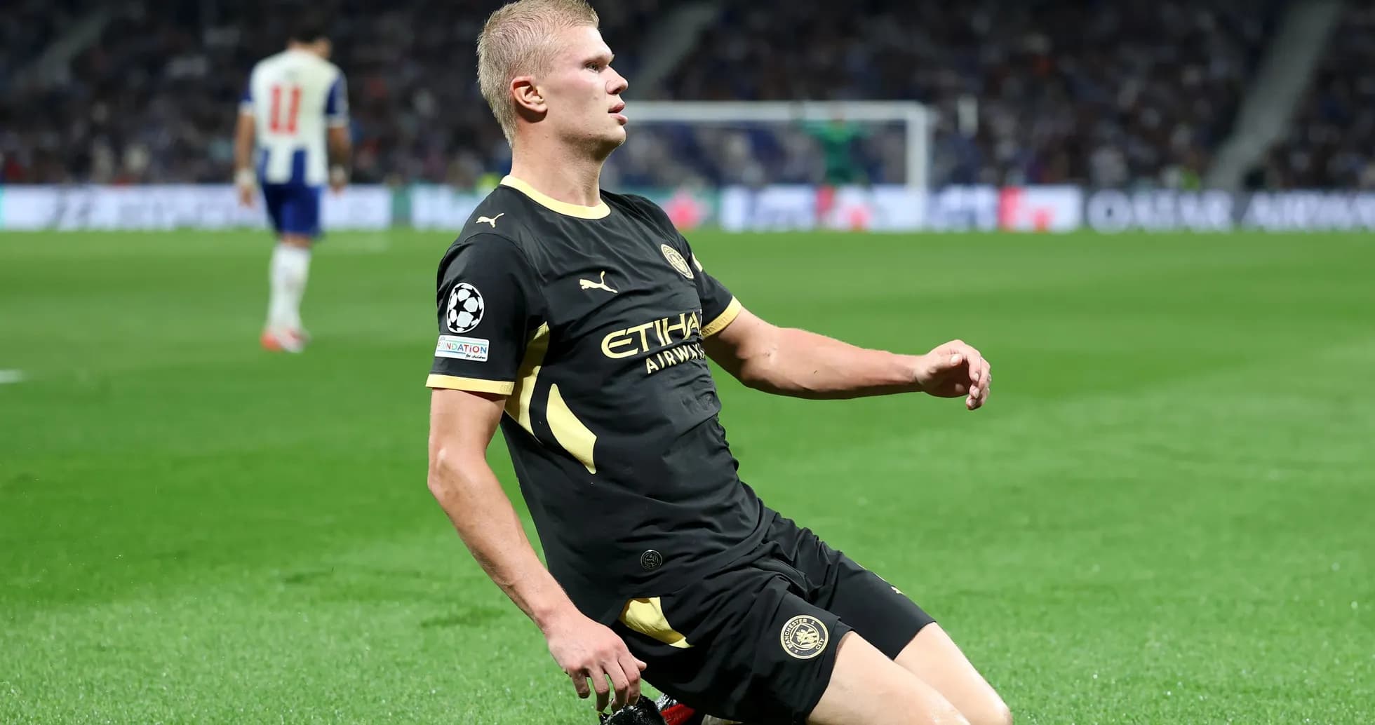 Player on knees celebrating during a match Player on knees celebrating during a match