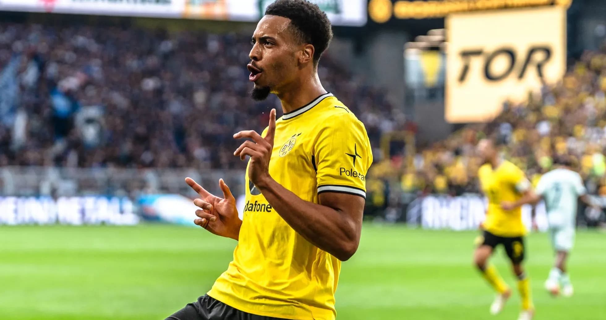 Player celebrating after scoring a goal in match Player celebrating after scoring a goal in match