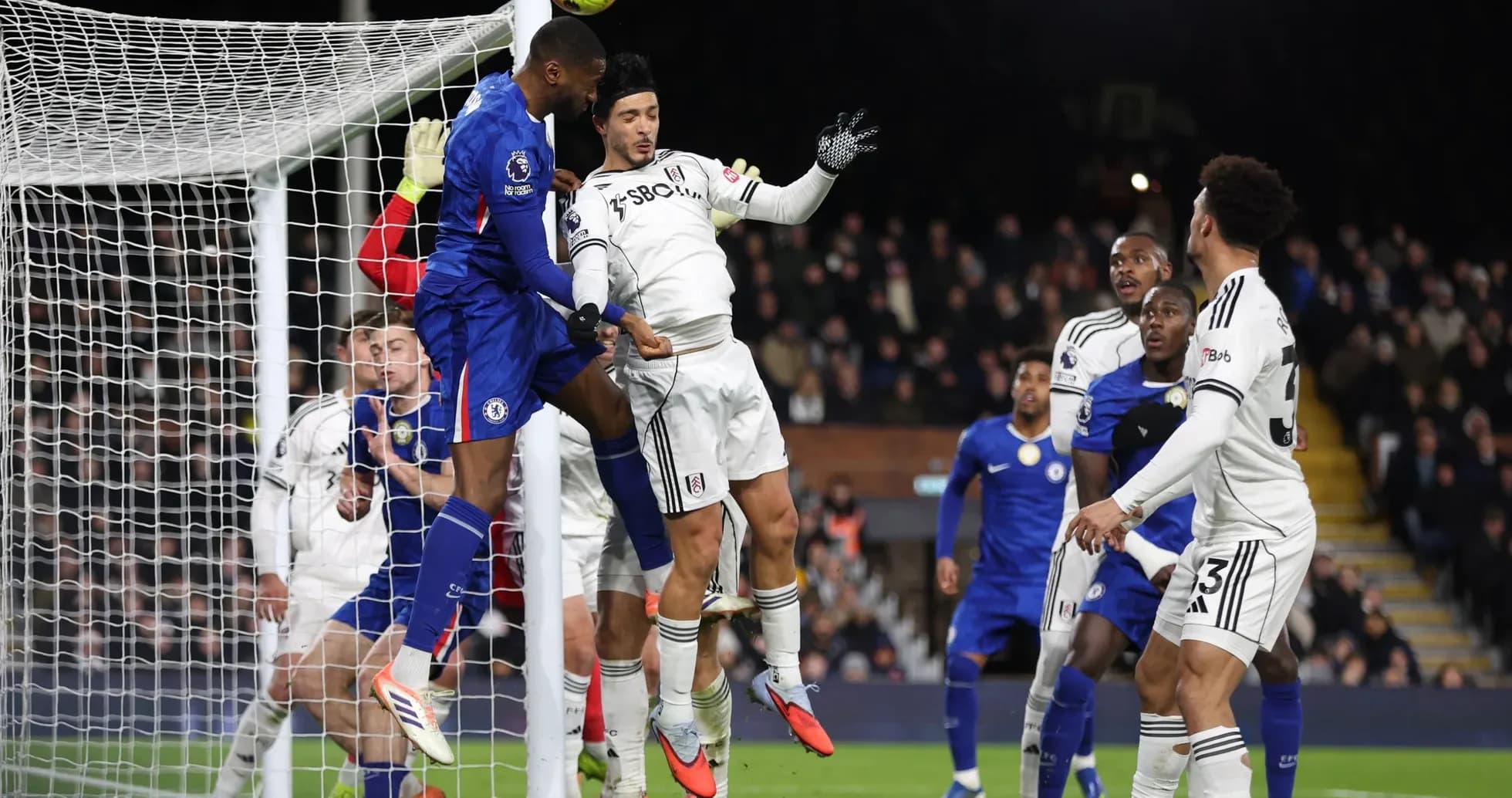 Chelsea player attempting a header during match Chelsea player attempting a header during match