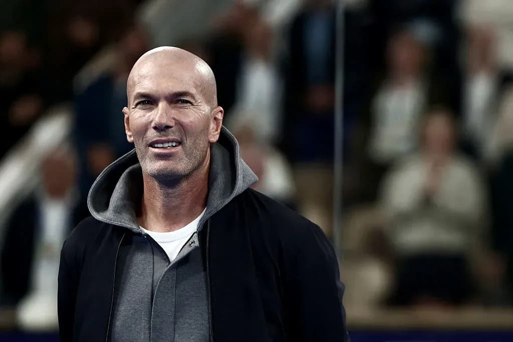 Man in casual attire smiling at event Man in casual attire smiling at event