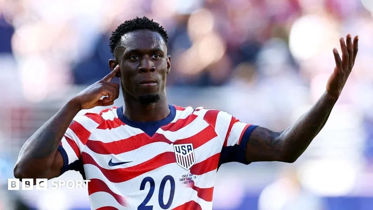 Player celebrating with hand gesture during match Player celebrating with hand gesture during match