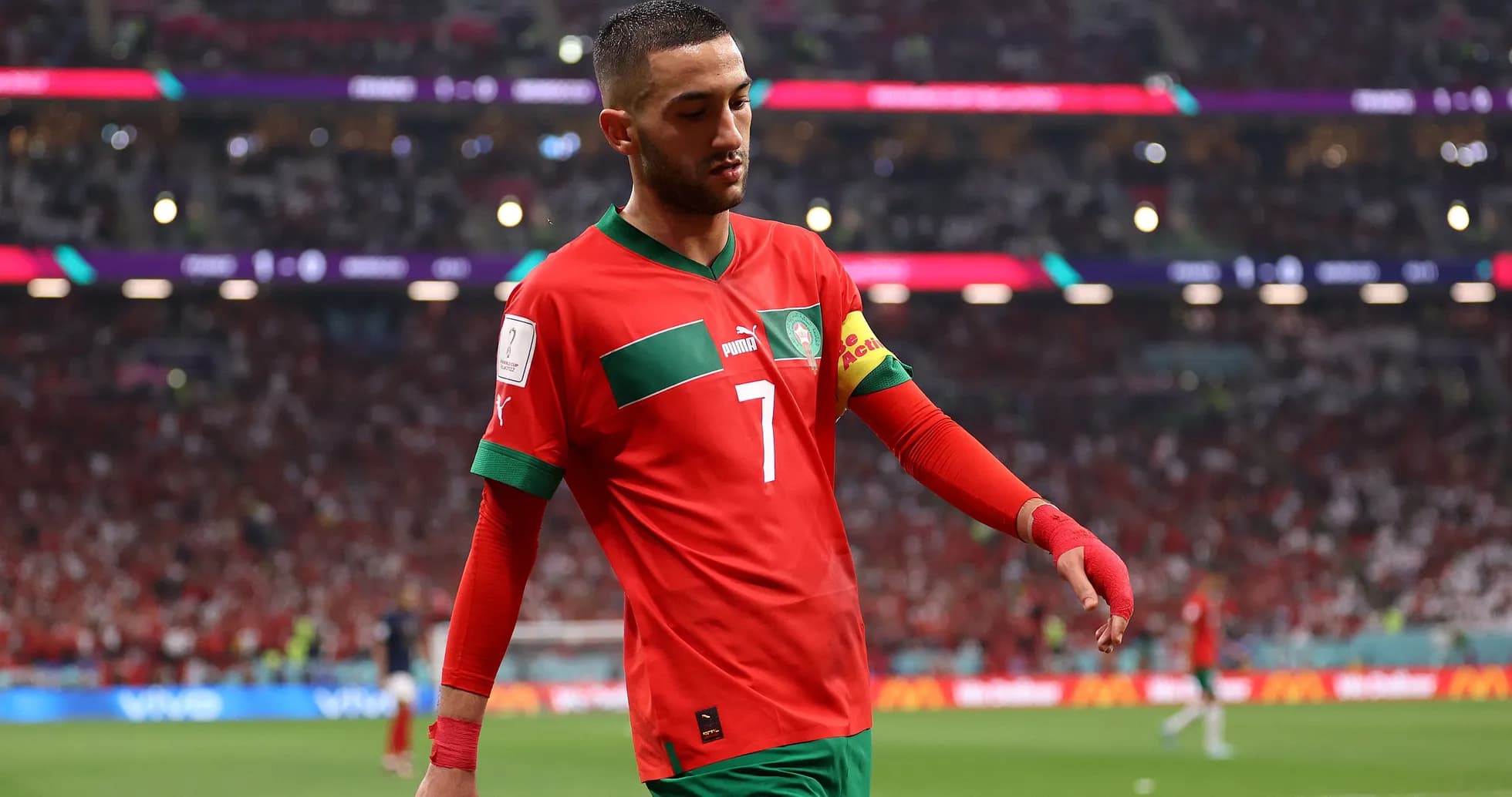 Moroccan player walking off the pitch during match Moroccan player walking off the pitch during match