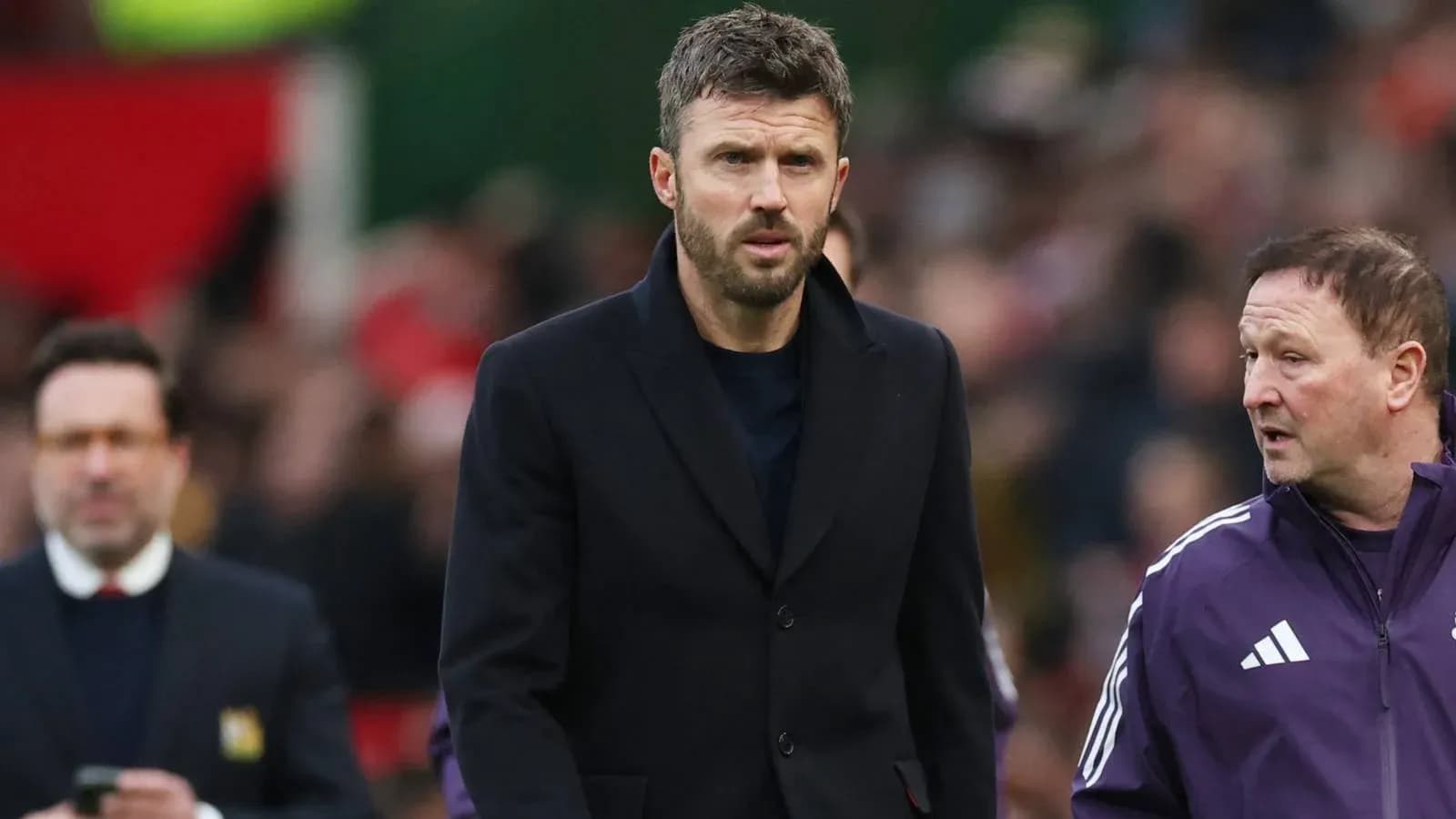Manager walking on the sidelines during match Manager walking on the sidelines during match