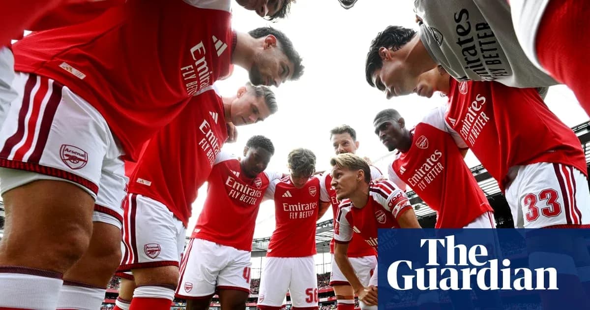 Arsenal players in a huddle before the match Arsenal players in a huddle before the match