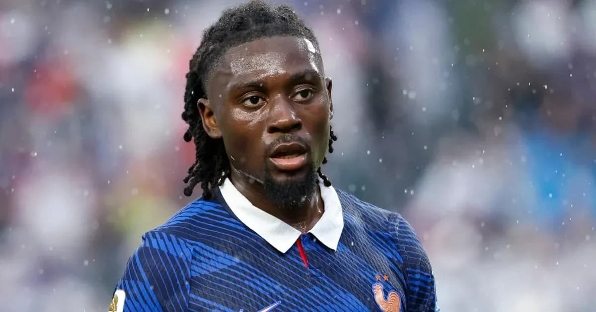Player in blue jersey during rainy match Player in blue jersey during rainy match