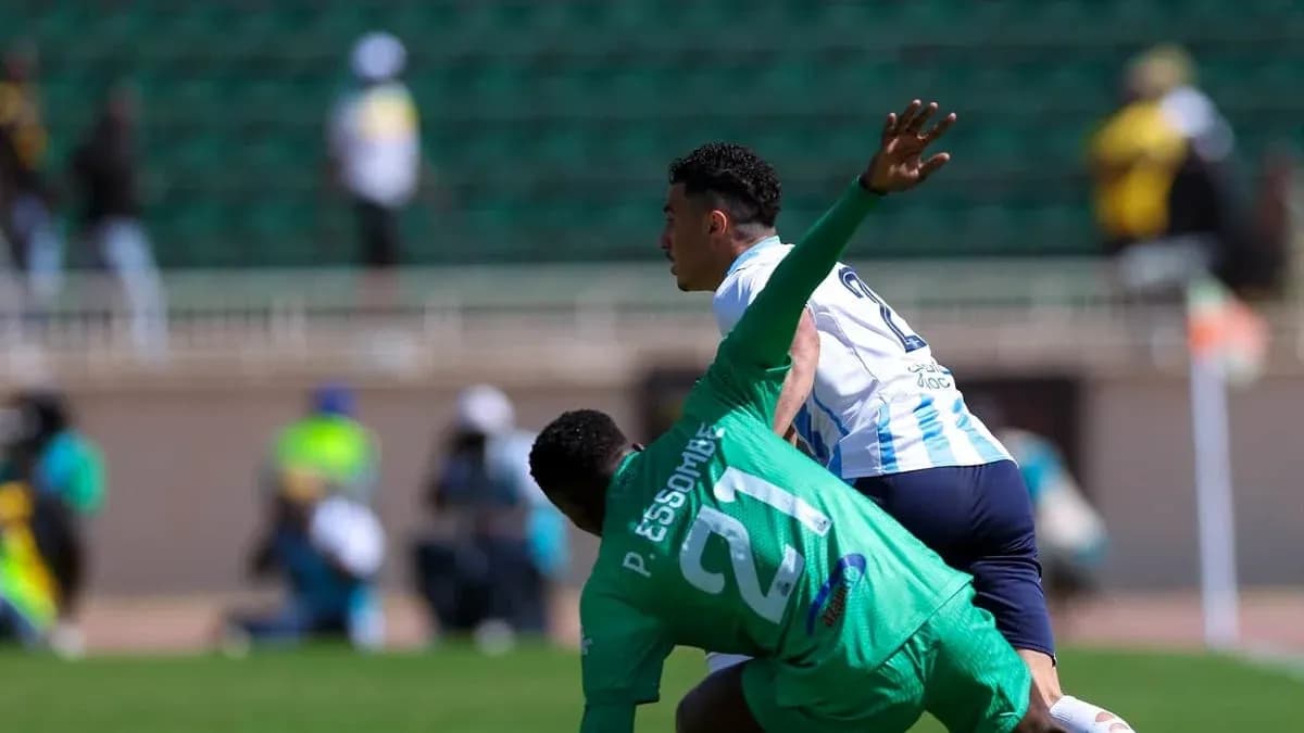 Pyramids FC player evading GOR Mahia goalkeeper Pyramids FC player evading GOR Mahia goalkeeper