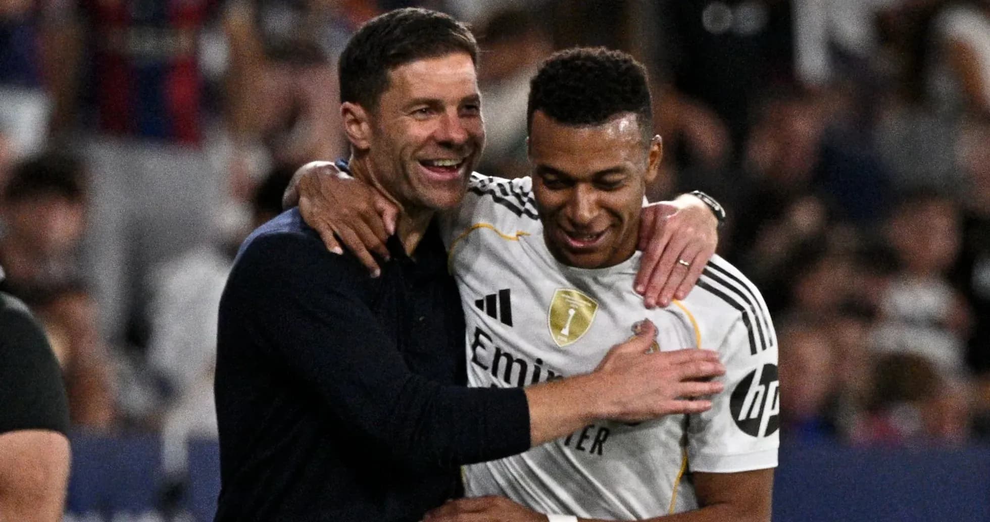 Coach and player celebrating after a match Coach and player celebrating after a match