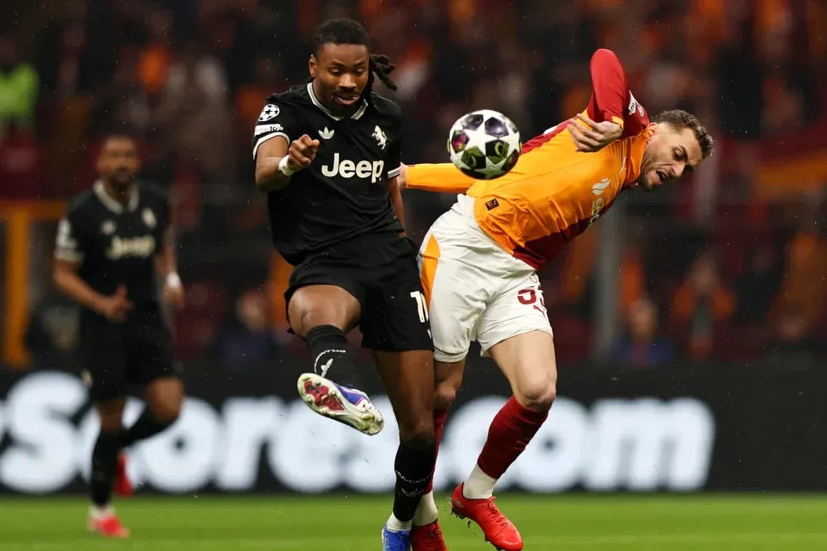 Player kicking ball during match action Player kicking ball during match action