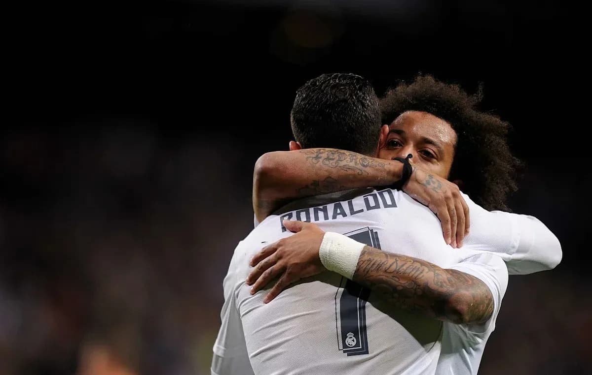 Cristiano Ronaldo and Marcelo celebrating a goal Cristiano Ronaldo and Marcelo celebrating a goal