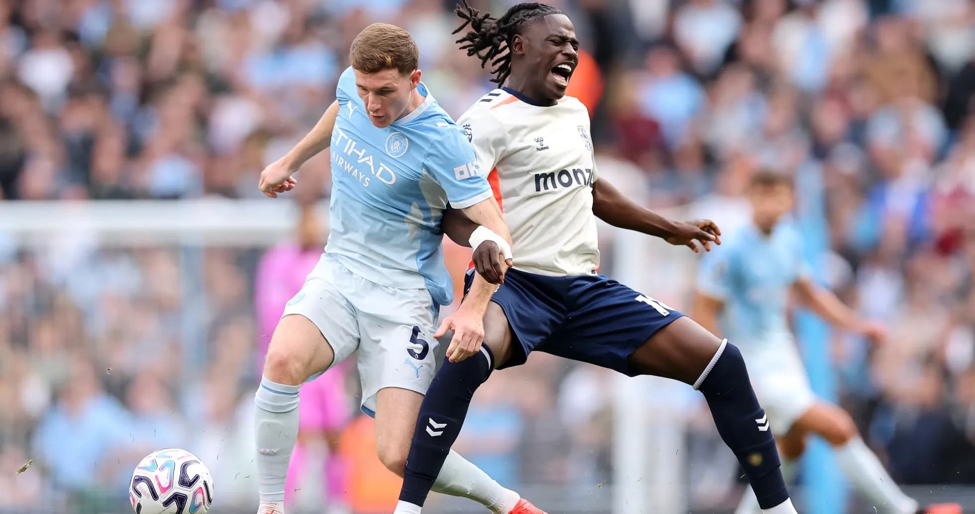 Manchester City player tackles Coventry opponent Manchester City player tackles Coventry opponent