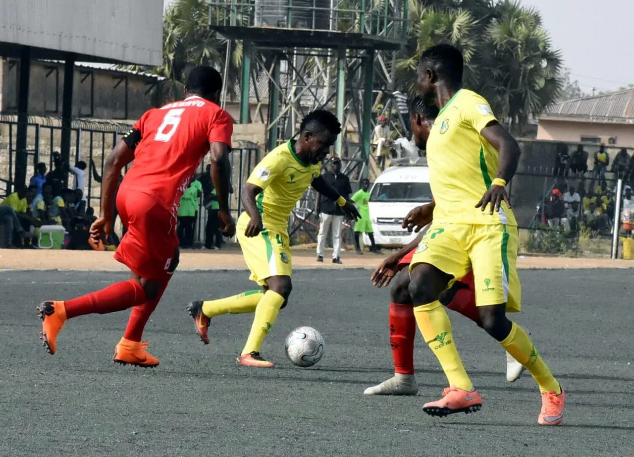 Players from Kwara United and Kano Pillars in action Players from Kwara United and Kano Pillars in action