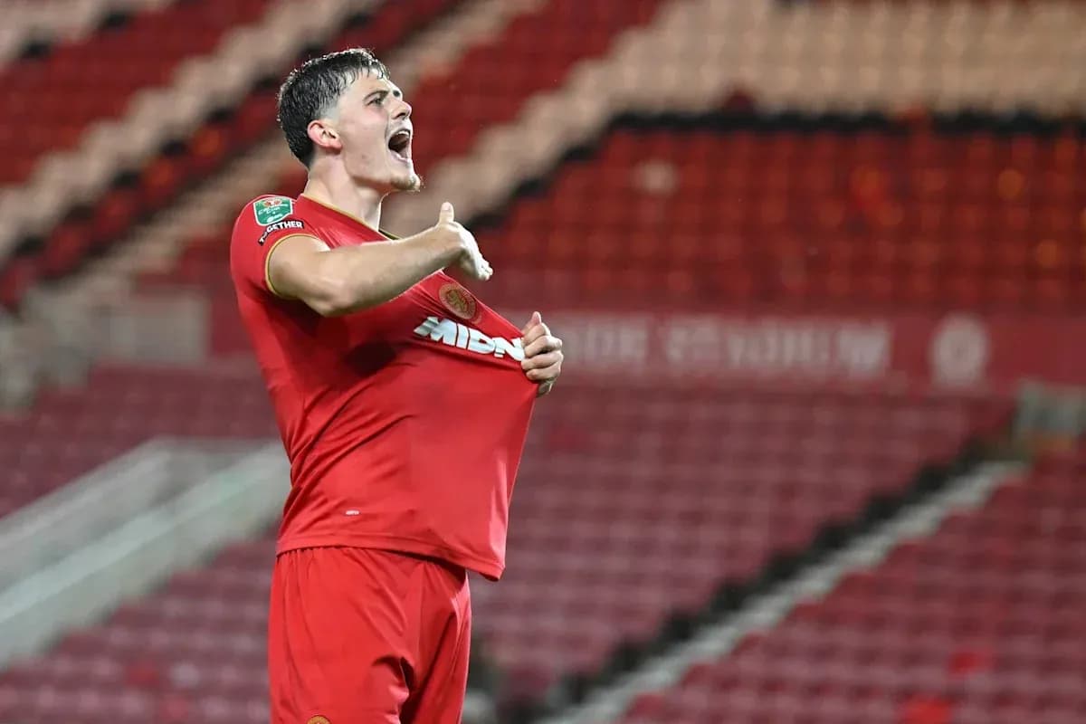 Player celebrating while lifting his shirt after scoring Player celebrating while lifting his shirt after scoring
