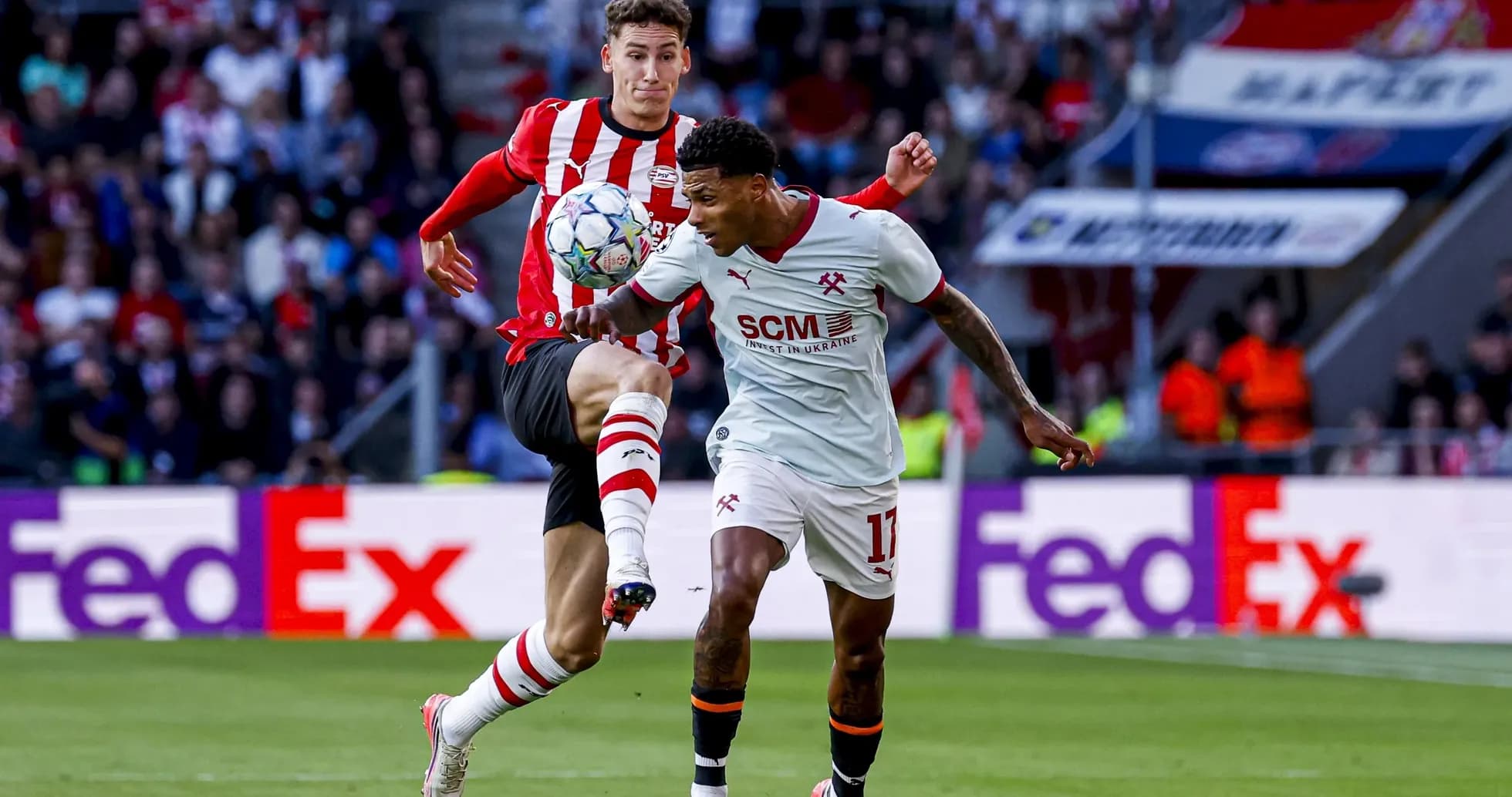 Player kicking the ball during competitive match Player kicking the ball during competitive match