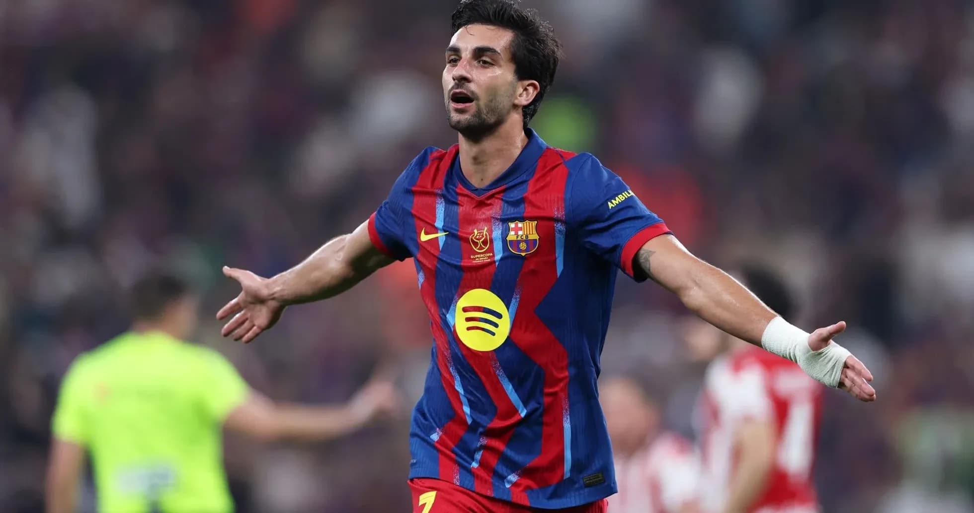 Player celebrating a goal during match at stadium Player celebrating a goal during match at stadium