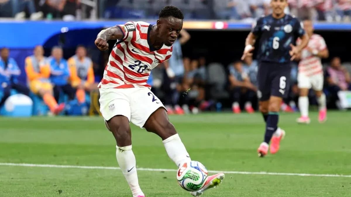 Player kicking the ball during a match Player kicking the ball during a match