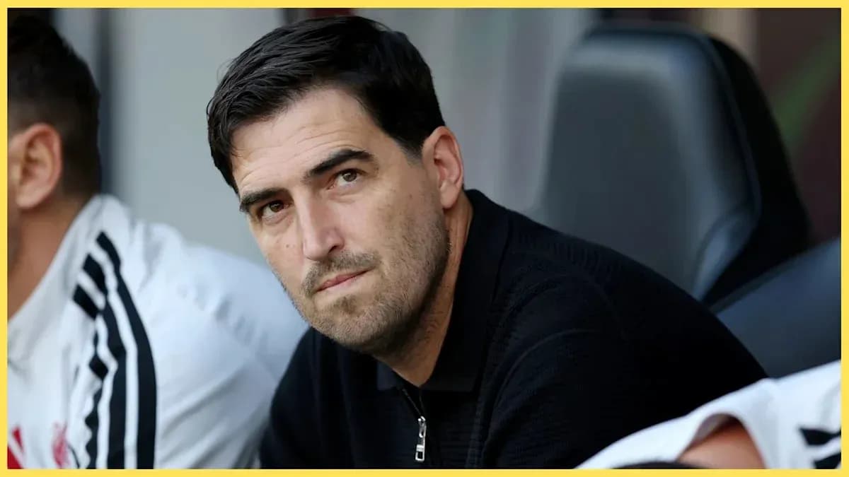 Coach observing from the bench during match Coach observing from the bench during match