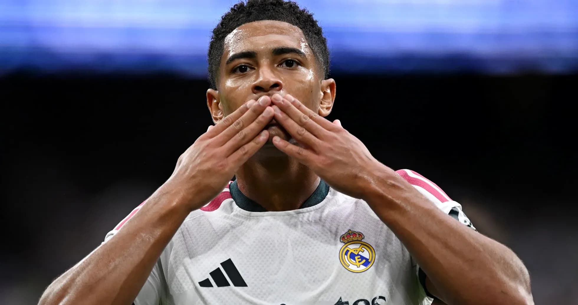 Player celebrating with a kiss gesture after scoring Player celebrating with a kiss gesture after scoring