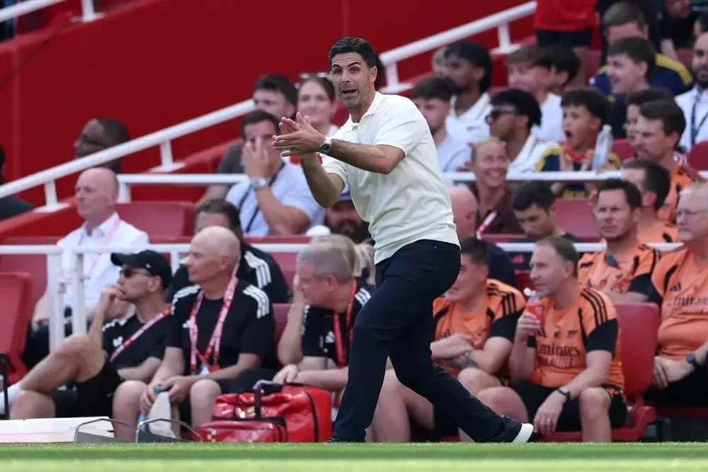 Coach gesturing from the sideline during match Coach gesturing from the sideline during match
